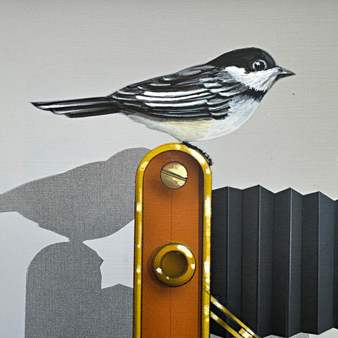 Detail of Photorealistic acrylic painting of a chickadee sitting atop an old camera and two books, one titled "Photography 5", against a white background by James Carter - Cottage Curator - Sperryville VA Art Gallery