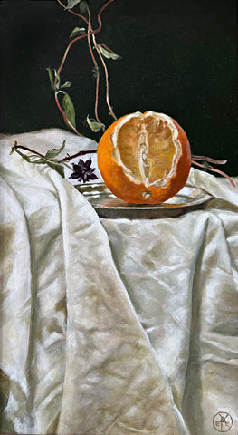 Still life oil painting of a cut orange on a silver plate against a dark green background with vines on a white tablecloth by Davette Leonard at Cottage Curator - Sperryville VA Art Gallery