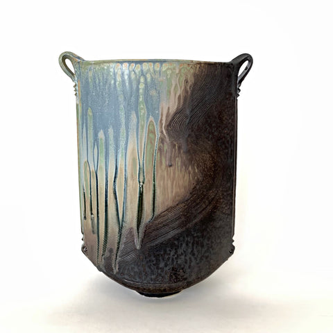 Front view of oval stoneware vessel with two handles in washed glazes of pastel blue, green and neutral browns and tans by Richard Aerni at Cottage Curator - Sperryville VA Art Gallery