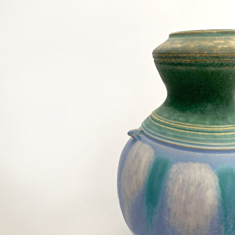 Detail of Symmetrical ceramic vessel with green upper and lower glazing and a center with blue and turquoise pattern with small handles by Richard Aerni at Cottage Curator - Sperryville VA Art Gallery