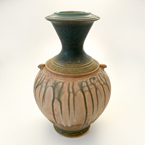 Symmetrical ceramic vessel with green upper and tan lower glazing and small handles by Richard Aerni at Cottage Curator - Sperryville VA Art Gallery
