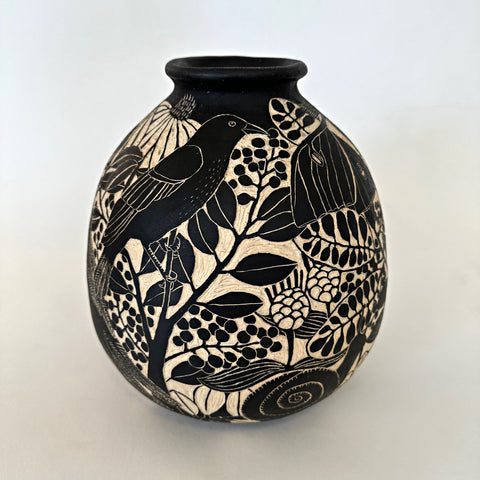 Black and white ceramic vessel with sgraffito scene featuring a crow, blackbird and various butterflies and insects by Carolyn Blazeck at Cottage Curator - Sperryville VA Art Gallery