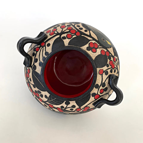 Top view of Black and white stoneware vessel with sgraffito carved images of Juncos and berries, with red and yellow painted details and red interior by Carolyn Blazeck at Cottage Curator - Sperryville VA