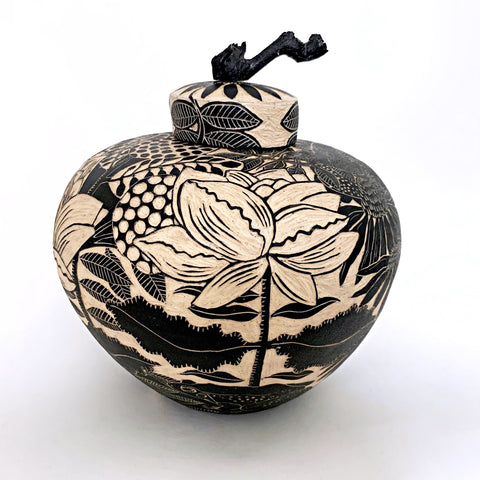 Black and white lidded vessel with handle in black terra sigilata and sgraffito with crows and hummingbird by Carolyn Blazeck at Cottage Curator - Sperryville VA Art Gallery