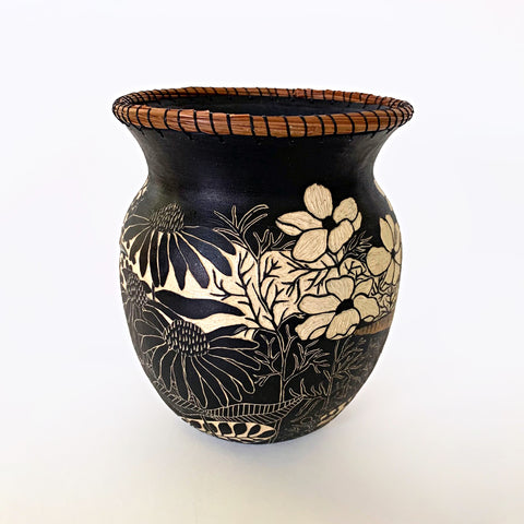 Black and white ceramic vessel with portrait of a carolina wren surrounded by plants in sgraffito with pine needles sewn around the rim by Carolyn Blazeck at Cottage Curator - Sperryville VA Art Gallery