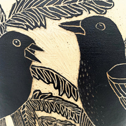 Detail of birds from Black terra sigillata vessel with pine needle edge with birds in sgraffito by Carolyn Blazeck at Cottage Curator - Sperryville VA Art Gallery