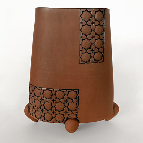 Stoneware vessel in natural tan clay color with patterned rectangles and three feet by Yoshi Fujii at Cottage Curator - Sperryville VA Art Gallery