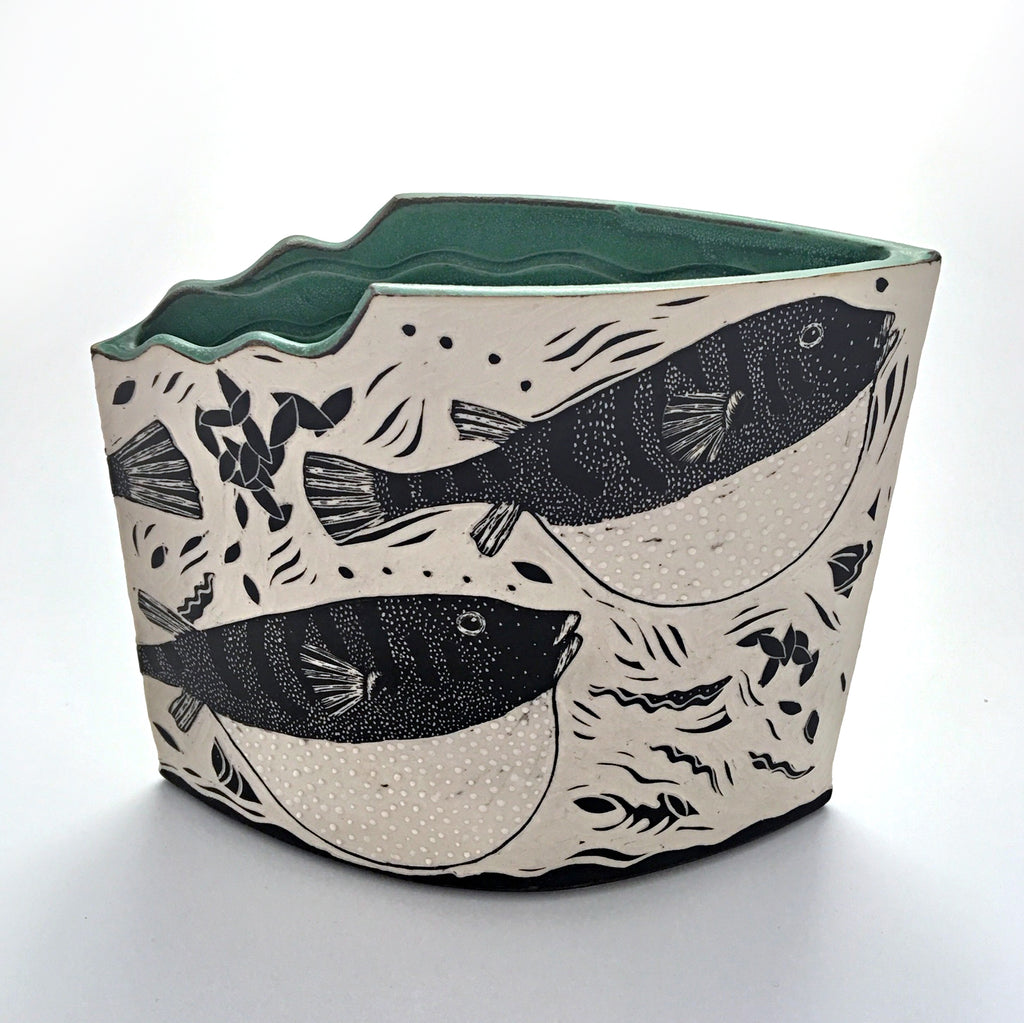Wedge shaped vase with cutout edge, sea green interior and black and white exterior sgraffito of blowtoads by Susan Gromen at Cottage Curator - Sperryville VA Art Gallery