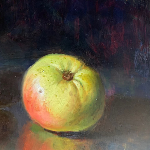 Detail of apple in still life painting of green grapes and lady apples on a reflective surface by Andrew Schuler Guerin at Cottage Curator - Sperryville VA Art Gallery
