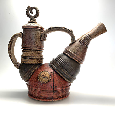 Ceramic teapot that appears to be made of jointed metal pieces by Steve Palmer at Cottage Curator art gallery in Sperryville Virginia
