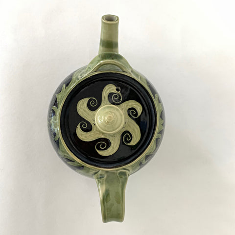 Top view of stoneware teapot with fish in green and black glaze by Neal Reed at Cottage Curator - Sperryville VA Art Gallery